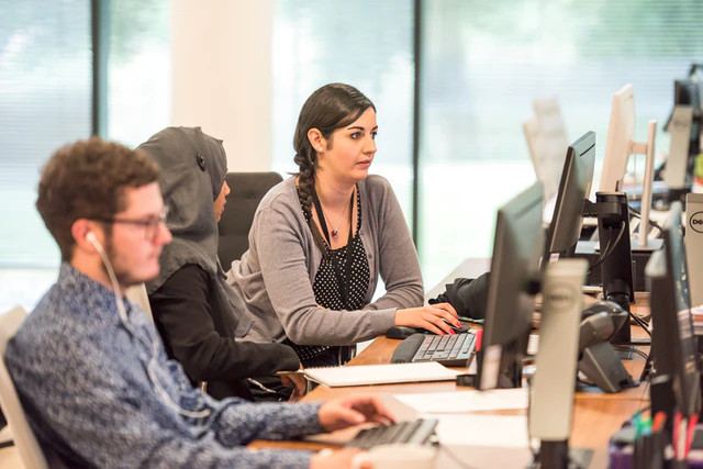 People working on computers